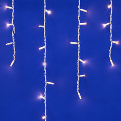 ULD-B3010-200/TWK WARMWHITE IP67 Бахрома светодиодная с эффектом мерцания, 3м. Соединяемая. 200 светодиодов. Теплый белый свет. Провод белый. TM Uniel., фото 